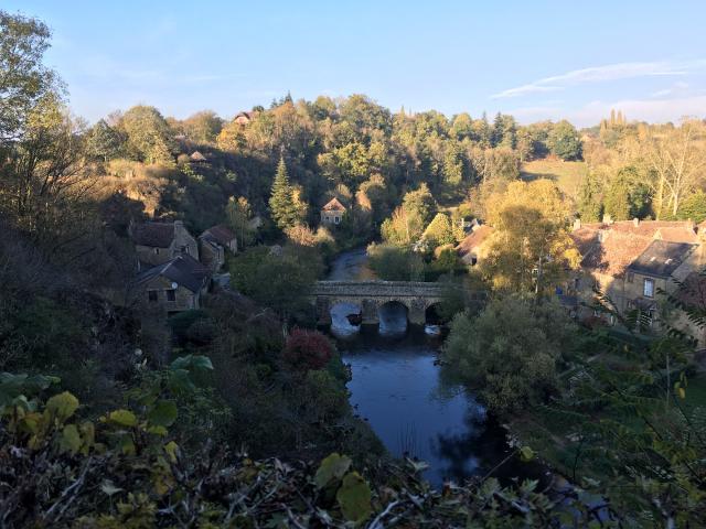 View of the Church of Saint-Céneri-le-Gérei in autumn